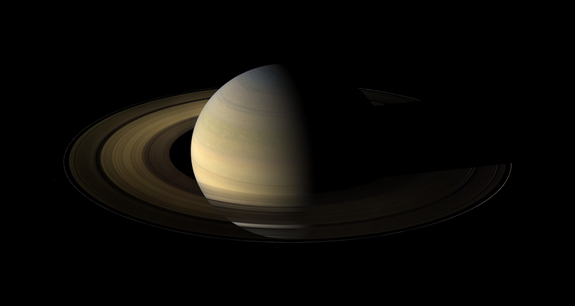 Seen from our planet, the view of Saturn’s rings during its equinox is extremely foreshortened and limited. But in orbit around Saturn, Cassini had no such problems in Aug. 2009. In this mosaic of images taken on Aug. 12, the shadows of the planet's expansive rings are compressed into a single, narrow band cast onto the planet.