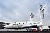 A replica of the Virgin Galactic Spaceship Two sits at the Farnborough International Airshow, Hampshire, England. The image was taken July 9, 2012.