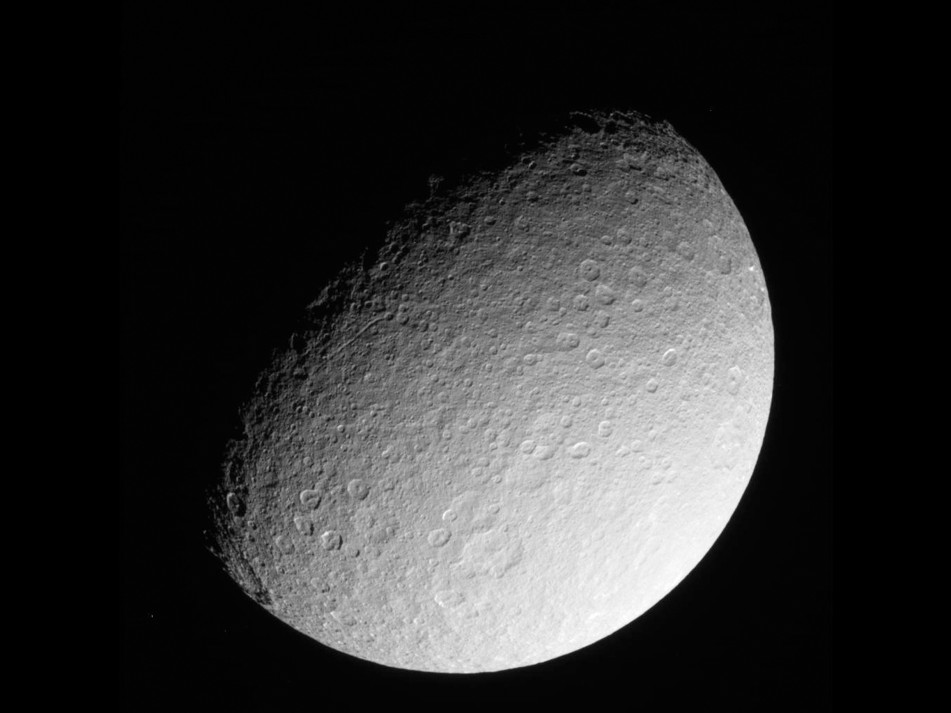 Rhea: Saturn's Dirty Snowball Moon