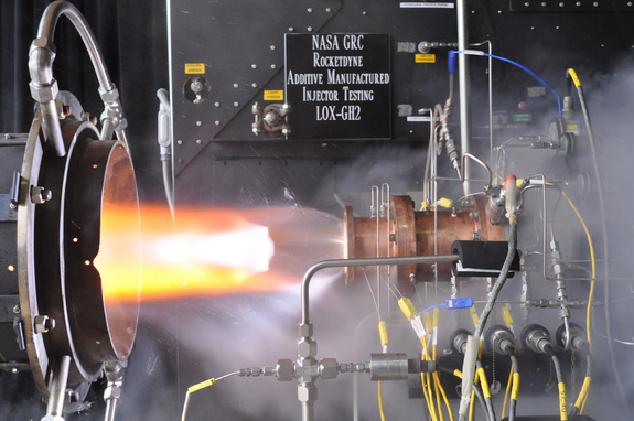 A liquid oxygen/gaseous hydrogen rocket injector assembly built using 3D printing technology is hot-fire tested at NASA Glenn Research Center’s Rocket Combustion Laboratory in Cleveland, Ohio.