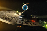 A ship traverses the unknown frontier of space in "Star Trek" (2009). 