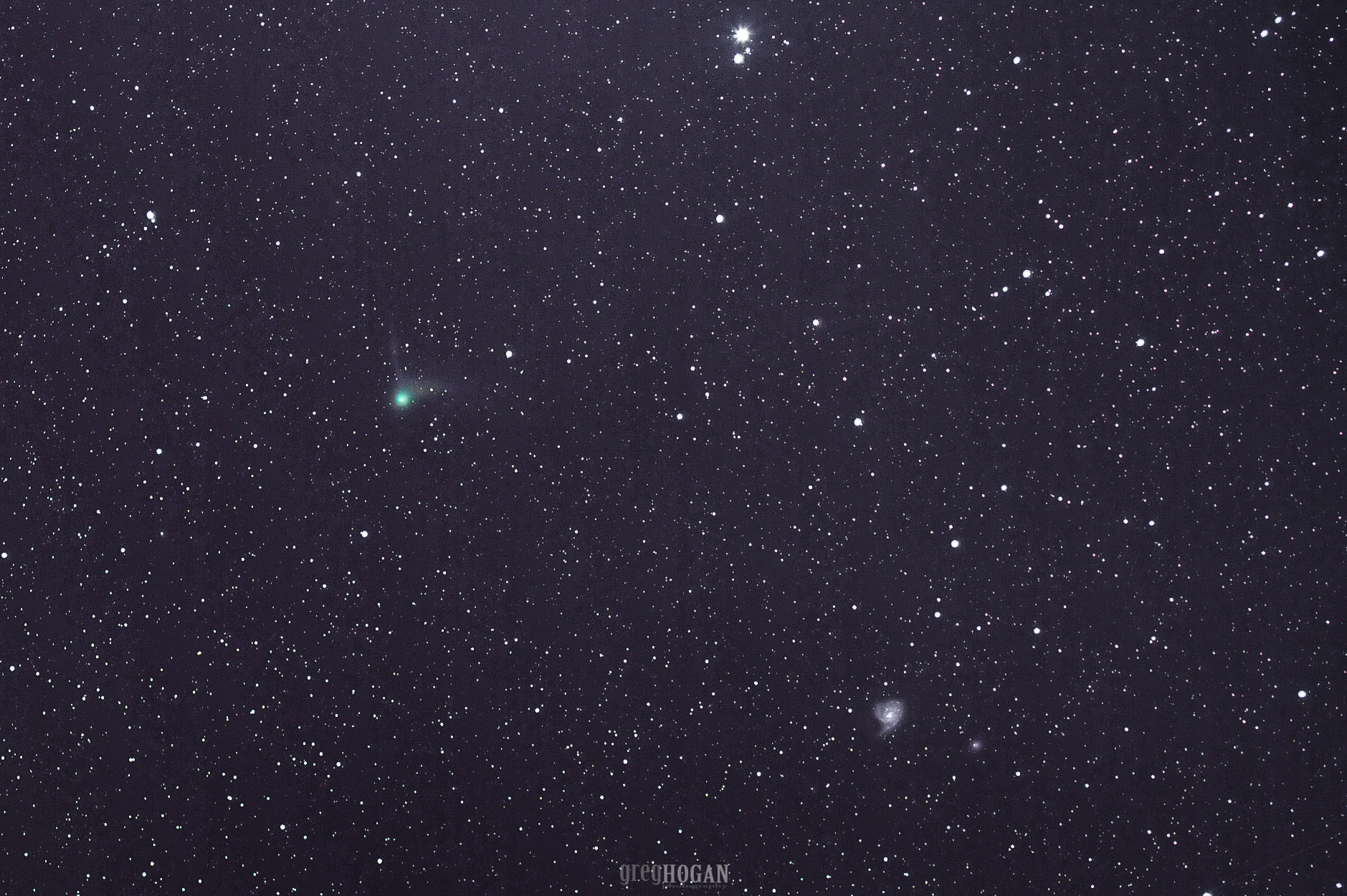 Comet Catalina and the Pinwheel Galaxy Caught in Stargazer's Photo