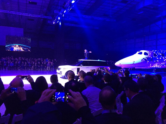 Virgin Galactic founder Sir Richard Branson rode in on the SUV pulling the company's new SpaceShipTwo space plane on Feb. 19, 2016.