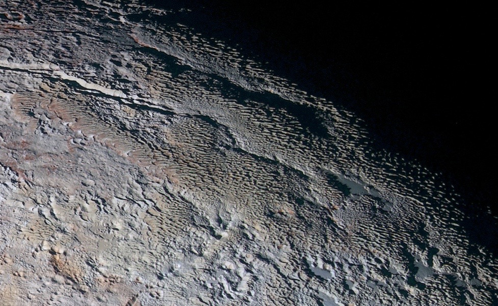 Are Pluto's Pebbled 'Snakeskin' Slopes Made of Ancient Stuff?