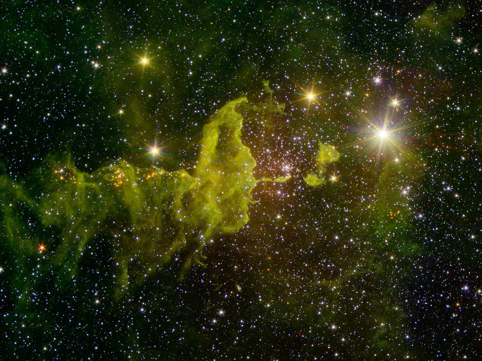 Giant Green 'Spider' Invades Stellar Nursery in Eerie New Image