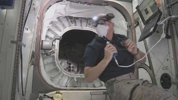 NASA astronaut Jeff Williams floats in front of the entrance to the Bigelow Expandable Activity Module (BEAM) on June 6, 2016.