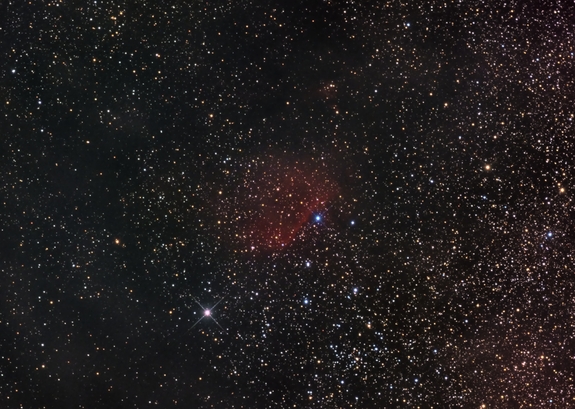 The Sh2-65 emission nebula is a very small and faint nebula located in the constellation Aquila, about 10,700 light-years from Earth.