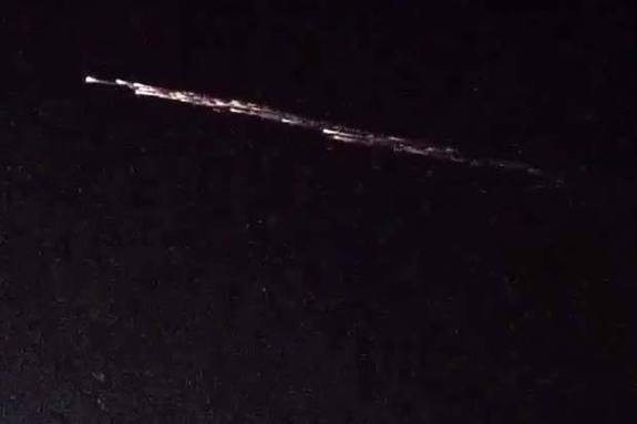 A brilliant fireball created by falling space junk from a Chinese Long March 7 rocket lit up the skies over Utah, Nevada, Colorado, Idaho and California late Thursday, July 27, 2016. This still image is from a video captured by observer Matt Holt in Utah, who posted his account on Twitter and YouTube.