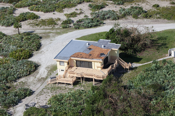 Roof damage from Hurricane Matthew to The Beach House at NASA’s Kennedy Space Center in Florida, a 1962 two-story house that was used by astronauts prior to their launches.
